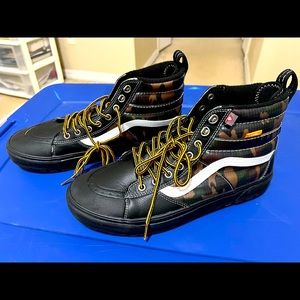 Leather camo off-the-wall vans.